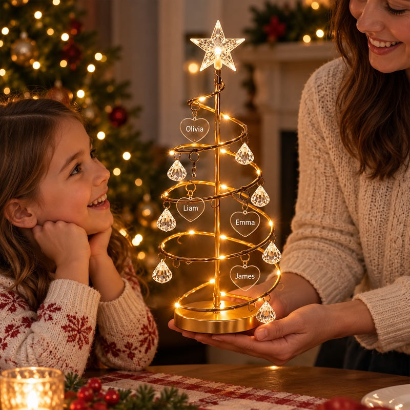 Personalized family name illuminated Christmas tree — family sharing a personalized tree