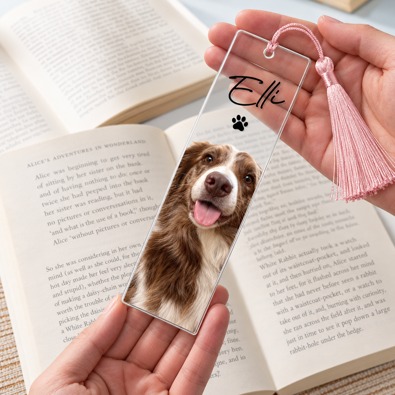 Elli dog portrait bookmark held in hands